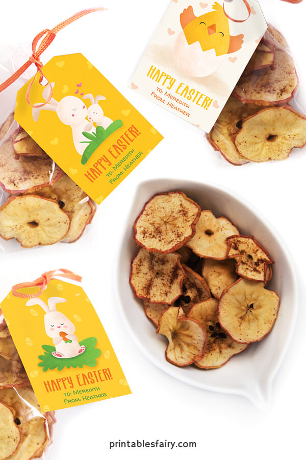 Apple chips in bags with gift tags featuring rabbits and a chick that say Happy Easter!