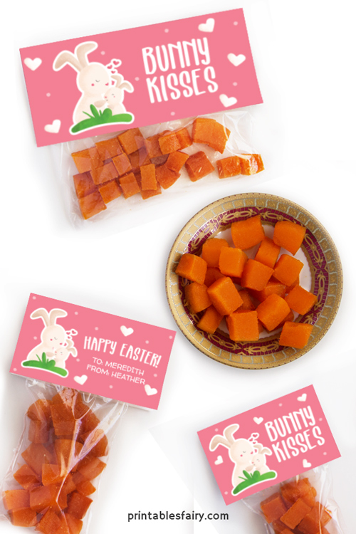 Bags of orange gummies with toppers of bunnies kissing