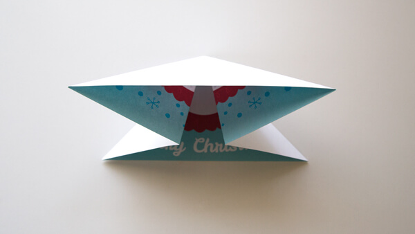 Fold inwards to make a triangle