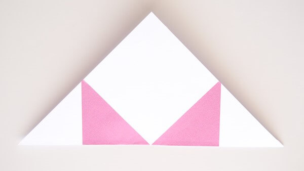 Square piece folded into a triangle
