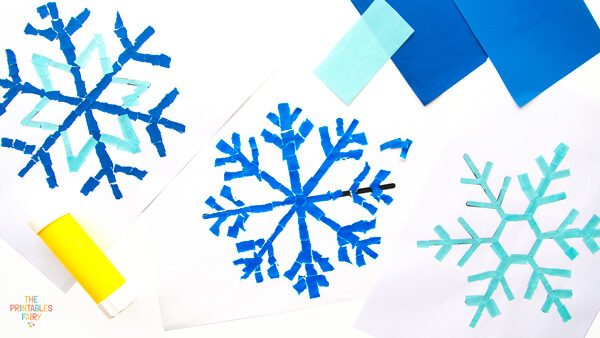 Torn Paper Snowflake Craft - The Printables Fairy