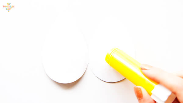 Applying glue inside the eggs