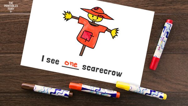 Painted scarecrow with the number "1" written