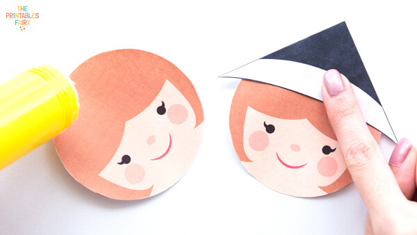 Gluing girl pilgrim face under the bookmark