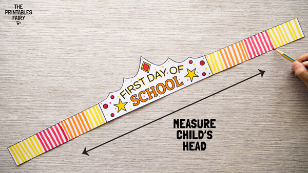 Marking child's head measurement 