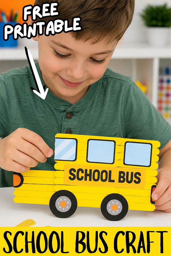 Kid playing with the School Bus Popsicle Stick Craft