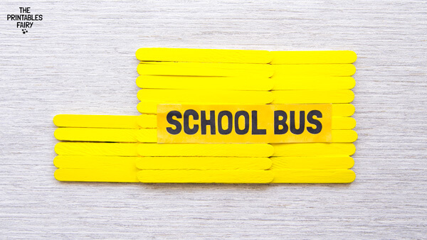 Gluing the school bus sign