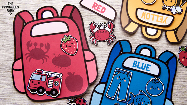 Red, blue, and yellow backpacks